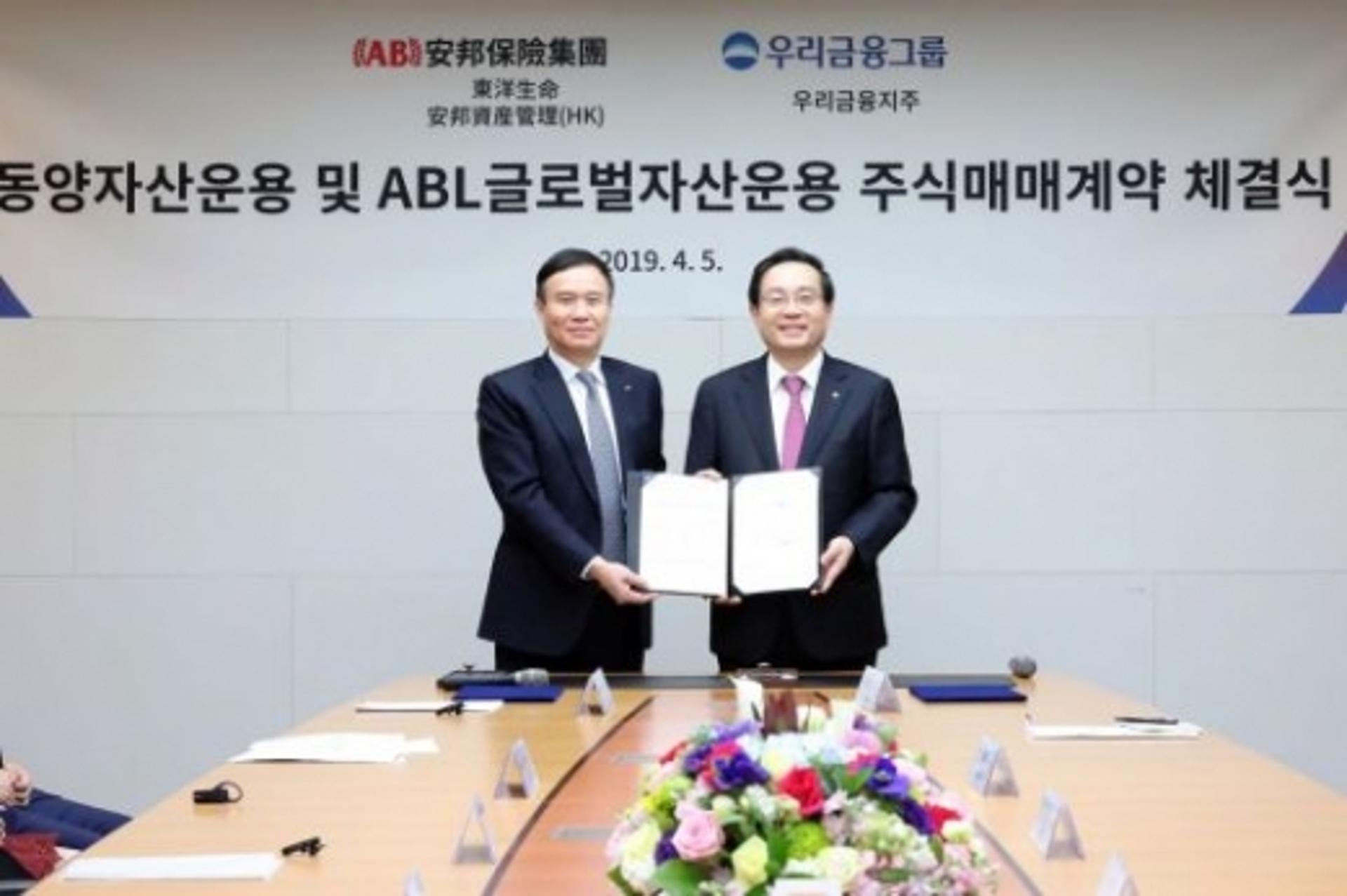 우리금융지주, 동양·ABL운용 인수… 첫 M&A 성공