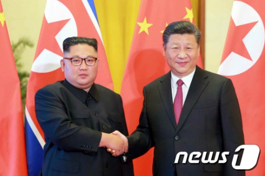 지난해 6월20일1박 2일 일정으로 중국을 방문한 김 위원장은 베이징 인민대회당에서 시진핑 주석과 정상회담을 가졌다./사진=뉴스1(노동신문)