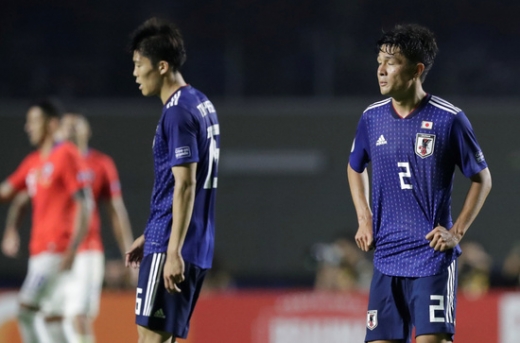 18일(한국시간) 브라질 상파울루 이스타지우 두 모룸비에서 열린 일본과 2019 코파 아메리카 브라질 C조 1차전에서 칠레에 0-4 대패를 당한 후 고개를 떨군 일본 선수들. /사진=로이터