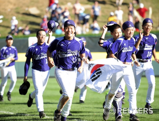 지난 2014년 8월25일 미국 펜실베니아주 윌리엄스포트 라마데 스타디움에서 열린 리틀야구 월드시리즈에서 미국 시카고 대표 일리노이를 8-4로 꺾고 우승을 차지했던 한국 리틀야구 대표팀. /사진=로이터DB