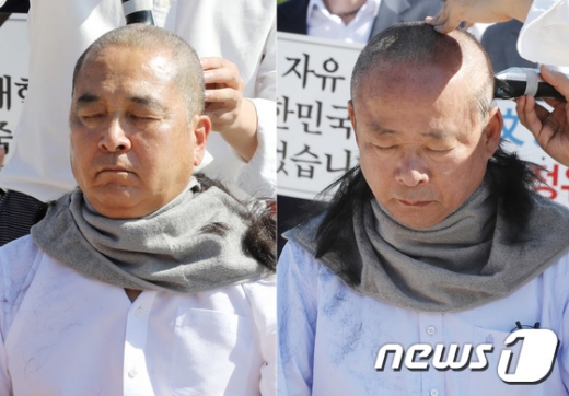 심재철 자유한국당 의원(왼쪽)과 국회부의장인 이주영 의원이 18일 청와대 분수대 앞에서 열린 최고위원-중진의원 연석회의에서 조국 법무부장관의 사퇴를 촉구하며 삭발을 하고 있다. /사진=뉴스1
